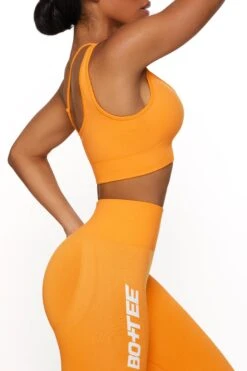 Asymmetric Seamless Crop Top In Orange -Core Fit Shop BT0021 3 Evolve Orange Cross Over Sports Bra 2