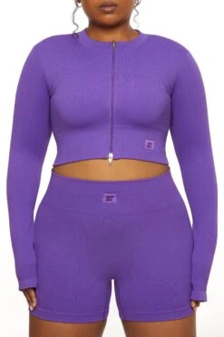 Long Sleeve Zip Crop Top In Purple -Core Fit Shop BT0448 1 All The Way Purple Long Sleeve Inverse Zip Crop Topcopy