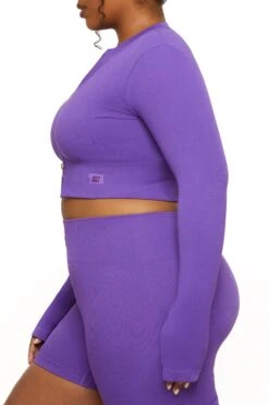 Long Sleeve Zip Crop Top In Purple -Core Fit Shop BT0448 3 All The Way Purple Long Sleeve Inverse Zip Crop Topcopy