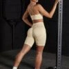 Seamless High Waist Biker Shorts In Beige -Core Fit Shop BT0465 7 BT0462 Streamline Resilience Beige Biker Short Cross Back Sports Bra