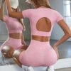 Seamless Backless Crop Top In Pink 2 Seamless Backless Crop Top In Pink -Core Fit Shop BT0571 7 Tenacity Pink Backless Crop Top 35c3c2dd b2e4 47fd b497 0eb48d76d8bd
