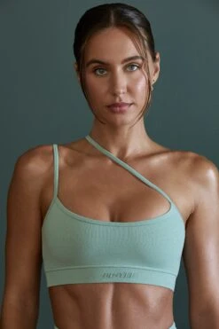 Asymmetric Neckline Sports Bra In Sage -Core Fit Shop BT0600 BT0607 2 Enhance Robust Green Cross Over Sports Bra Cycling Shorts
