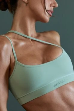 Asymmetric Neckline Sports Bra In Sage -Core Fit Shop BT0600 BT0607 6 Enhance Robust Green Cross Over Sports Bra Cycling Shorts