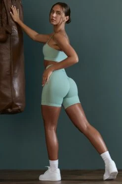 Asymmetric Neckline Sports Bra In Sage -Core Fit Shop BT0600 BT0607 9 Enhance Robust Green Cross Over Sports Bra Cycling Shorts