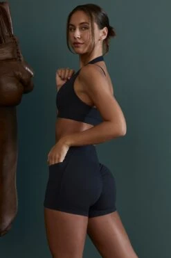 Wrap Over Mini Shorts With Pockets In Black 15 Wrap Over Mini Shorts With Pockets In Black -Core Fit Shop BT0603 BT0606 12 Courage Black Plunge Sport Bra Condition Mini Shorts 2