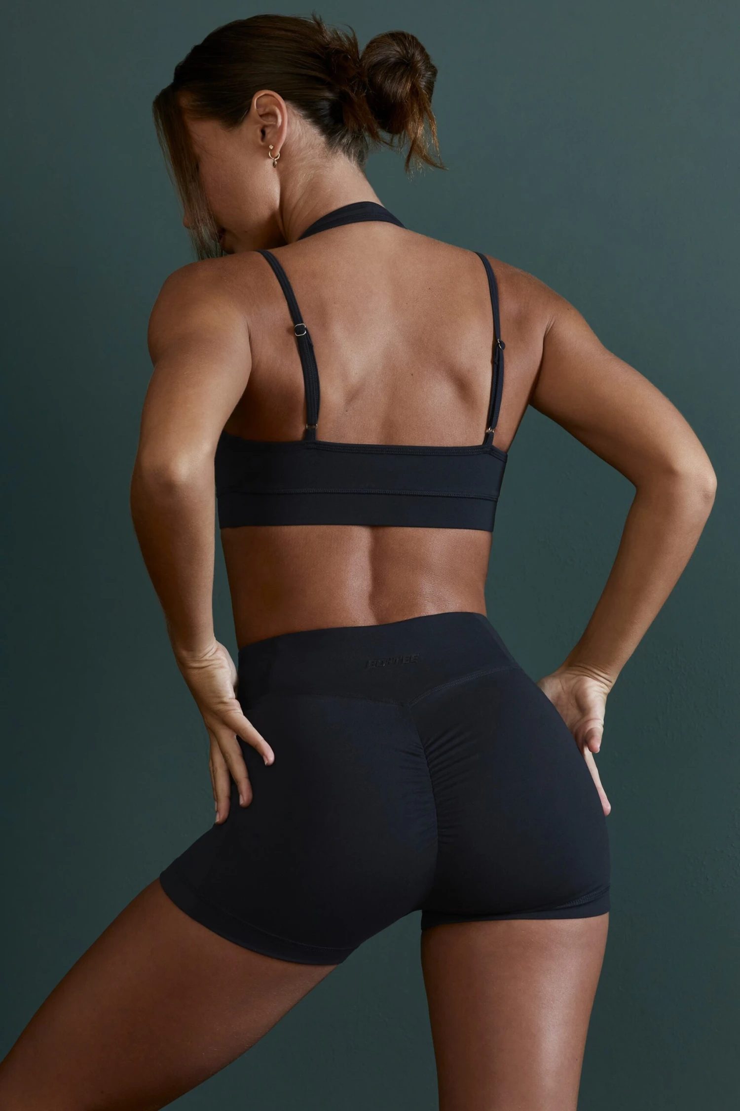 Plunge Neck Wrap Over Sports Bra In Black 4 Plunge Neck Wrap Over Sports Bra In Black - Image 2