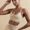 Curved Neckline Sports Bra In Beige 1 Curved Neckline Sports Bra In Beige -Core Fit Shop BT0610 BT0591 11 Humus Brown Sports Bra Sports Leggings