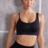 Asymmetric Sports Bra In Jet Black 2 Asymmetric Sports Bra In Jet Black -Core Fit Shop BT0614 1 Stretch Black Asymmetrical Sport Bra