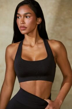 Cut Out Define Luxe Sports Bra In Black 12 Cut Out Define Luxe Sports Bra In Black -Core Fit Shop BT0666 2 Mindset Black Cut Out Sports Bra