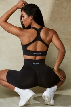 Cut Out Define Luxe Sports Bra In Black 16 Cut Out Define Luxe Sports Bra In Black -Core Fit Shop BT0666 6 Mindset Black Cut Out Sports Bra