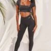 Slinky Crop Top In Black -Core Fit Shop bt0008 bt0009 2 black short sleeved side tied bust flattering crop top high waisted leggings two piece workout sportswear 982199df 66bc 4cb4 9b8c e4f69850c6b6