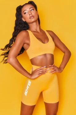 Unleash Seamless Cycling Shorts In Orange -Core Fit Shop bt0020 bt0027 2 orange scoop neckline crop top workout set.jpg 3