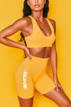 Unleash Seamless Cycling Shorts In Orange -Core Fit Shop bt0020 bt0027 6 orange scoop neckline crop top workout set.jpg 3