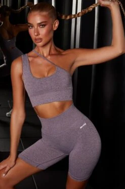 Strive Seamless Asymmetric Crop Top In Purple 11 Strive Seamless Asymmetric Crop Top In Purple -Core Fit Shop bt0088 bt0084 4 strive fuel purple asymmetrical crop top cycling shorts set 1