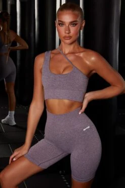 Strive Seamless Asymmetric Crop Top In Purple 12 Strive Seamless Asymmetric Crop Top In Purple -Core Fit Shop bt0088 bt0084 5 strive fuel purple asymmetrical crop top cycling shorts set 1