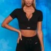 Perform Ribbed Short Sleeve Zip Front Crop Top In Black -Core Fit Shop bt0102 bt0104 2 perform results black zip front short sleeve crop top tie front shorts sportswear set