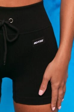 Results Ribbed Tie Front Mini Shorts In Black -Core Fit Shop bt0102 bt0104 7 perform results black zip front short sleeve crop top tie front shorts sportswear set