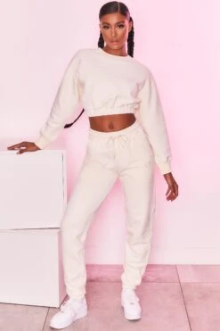 Cropped Sweatshirt In Ivory -Core Fit Shop bt0129 bt0130 2 self love take care ivory heart logo comfy cropped sweater joggers sportswear