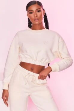 Cropped Sweatshirt In Ivory -Core Fit Shop bt0129 bt0130 3 self love take care ivory heart logo comfy cropped sweater joggers sportswear