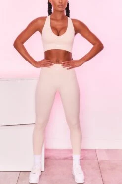 Ribbed Plunge Neck Sports Bra In Cream 15 Ribbed Plunge Neck Sports Bra In Cream -Core Fit Shop bt0135 bt0131 1 be the best strong cream ribbed sports bra high waisted leggings sportswear set 5