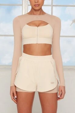 Tulip Hem Running Shorts In Beige -Core Fit Shop bt0144 bt0141 10 healthy beige double layer shorts alive cutout zip crop top 1