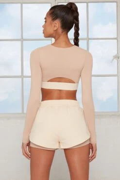 Tulip Hem Running Shorts In Beige -Core Fit Shop bt0144 bt0141 3 healthy beige double layer shorts alive cutout zip crop top 1