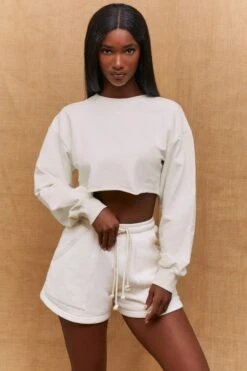 Momentum Raw Hem Cropped Sweatshirt In Ivory -Core Fit Shop bt0193 2 momentum ivory long sleeved cropped sweatshirt