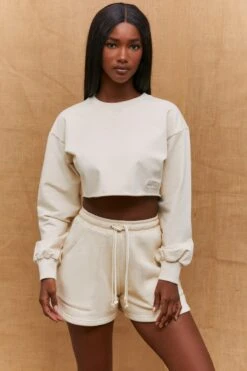 Momentum Raw Hem Cropped Sweatshirt In Sand -Core Fit Shop bt0193 3 momentum sand long sleeved cropped sweatshirt