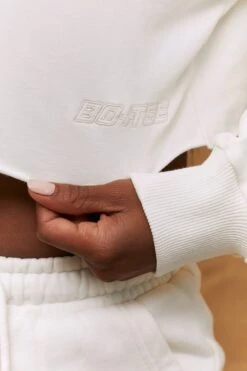 Momentum Raw Hem Cropped Sweatshirt In Ivory -Core Fit Shop bt0193 5 momentum ivory long sleeved cropped sweatshirt