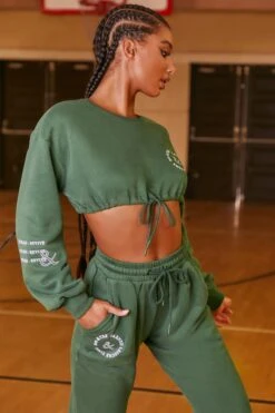 Keep Moving Cropped Drawstring Sweatshirt In Green -Core Fit Shop bt0201 bt0202 5 keep moving champion green cropped drawstring sweatshirt joggers set 6