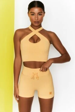 Ribbed Tie Front Mini Shorts In Yellow -Core Fit Shop bt0301 bt0303 1 move it adapt yellow high waist draw string ribbed cycle shorts cross strap ribbed crop top 2