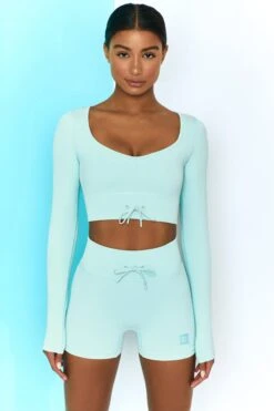 Time Check Ribbed Long Sleeve Crop Top In Light Blue -Core Fit Shop bt0301 bt0306 1 move it time check light blue long sleeved strap crop top tie front shorts ribbed pastel