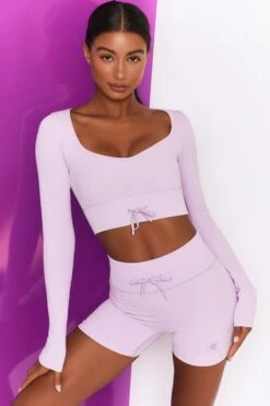 Time Check Ribbed Long Sleeve Crop Top In Lilac -Core Fit Shop bt0301 bt0306 2 move it time check lilac high waist draw string ribbed cycle shorts long sleeved strap crop top 3