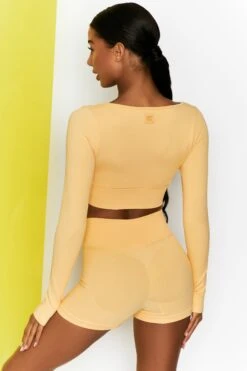 Time Check Ribbed Long Sleeve Crop Top In Yellow -Core Fit Shop bt0301 bt0306 6 move it time check yellow high waist draw string ribbed cycle shorts long sleeved strap crop top