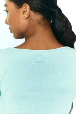 Time Check Ribbed Long Sleeve Crop Top In Light Blue -Core Fit Shop bt0301 bt0306 7 move it time check light blue long sleeved strap crop top tie front shorts ribbed pastel