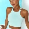Feel Your Power Ribbed Racer Crop Top In Light Blue 1 Feel Your Power Ribbed Racer Crop Top In Light Blue -Core Fit Shop bt0302 bt0304 12 energise light blue ribbed drawstring leggings feel your power ribbed cross strap crop top 2