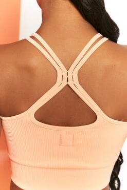 Feel Your Power Ribbed Racer Crop Top In Peach -Core Fit Shop bt0302 bt0304 5 energise peach ribbed drawstring workout joggers feel your power ribbed workout top 3