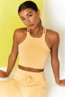 Feel Your Power Ribbed Racer Crop Top In Yellow -Core Fit Shop bt0302 bt0304 8 energise yellow ribbed drawstring leggings feel your power ribbed cross strap crop top 2 1