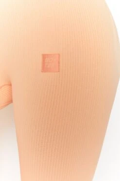 Energise Ribbed Tie Front Full Length Leggings In Peach -Core Fit Shop bt0302 bt0304 9 energise peach ribbed drawstring workout joggers feel your power ribbed workout top 1 1