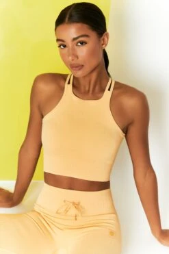 Feel Your Power Ribbed Racer Crop Top In Yellow