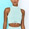 Miles Ahead Ribbed High Neck Crop Top In Light Blue -Core Fit Shop bt0305 bt0301 1 miles ahead move it light blue ribbed work out crop top high waist draw string ribbed cycle shorts top