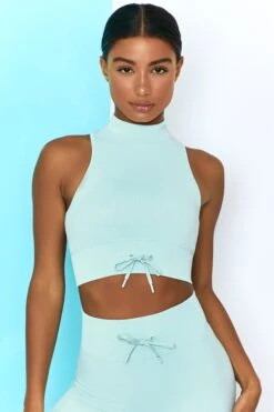 Miles Ahead Ribbed High Neck Crop Top In Light Blue -Core Fit Shop bt0305 bt0301 3 miles ahead move it light blue ribbed work out crop top high waist draw string ribbed cycle shorts top