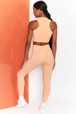 Energise Ribbed Tie Front Full Length Leggings In Peach -Core Fit Shop bt0305 bt0302 4 energise peach ribbed drawstring workout joggers mile ahead ribbed work out crop top