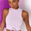 Miles Ahead Ribbed High Neck Crop Top In Lilac -Core Fit Shop bt0305 bt0318 10 miles ahead lilac ribbed sleeveless turtle neck draw string crop top long distance ribbed draw string shorts 2