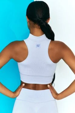 Miles Ahead Ribbed High Neck Crop Top In Cool Blue -Core Fit Shop bt0305 bt0318 7 miles ahead cool blue ribbed sleeveless turtle neck draw string crop top long distance ribbed draw string shorts