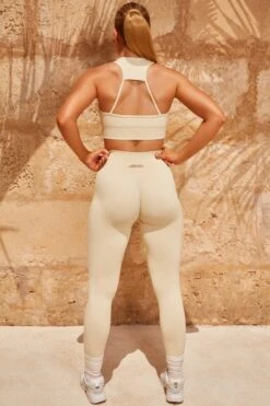Cut Out Sports Bra In Cream 10 Cut Out Sports Bra In Cream -Core Fit Shop bt0324 bt0342 4 intensity accelerate cream racer back sports bra contour leggings set 3