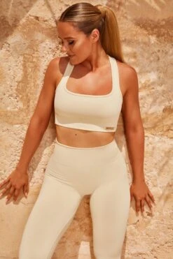Cut Out Sports Bra In Cream 12 Cut Out Sports Bra In Cream -Core Fit Shop bt0324 bt0342 6 intensity accelerate cream racer back sports bra contour leggings set 3