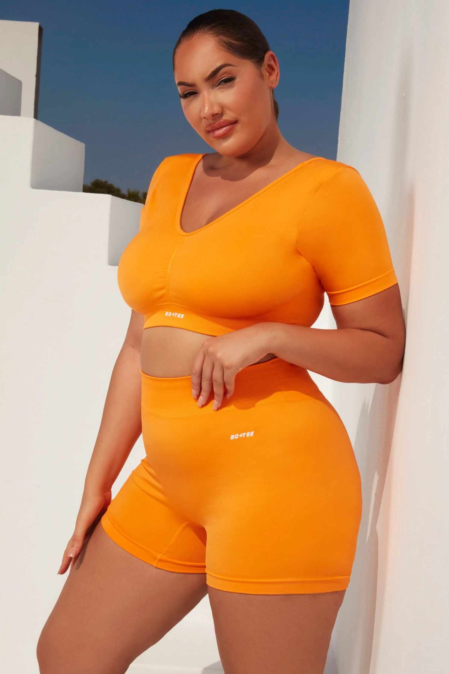 Curved Waist Seamless Mini Shorts In Orange 10 Curved Waist Seamless Mini Shorts In Orange - Image 8