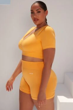 Curved Waist Seamless Mini Shorts In Light Orange -Core Fit Shop bt0361 bt0366 13 gradient flash light orange scrunched front short sleeve crop top high waist shorts sportswear set 3