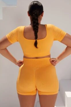 Curved Waist Seamless Mini Shorts In Light Orange -Core Fit Shop bt0361 bt0366 14 gradient flash light orange scrunched front short sleeve crop top high waist shorts sportswear set 3